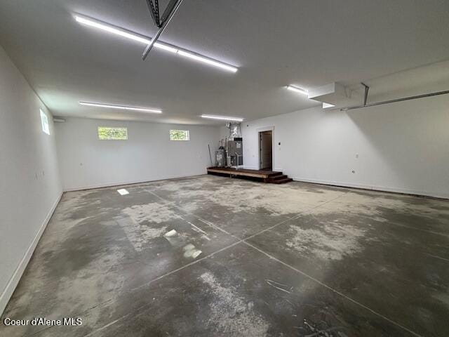 32926 N 10th Ave, Spirit Lake, ID 83869 - garage featuring baseboards