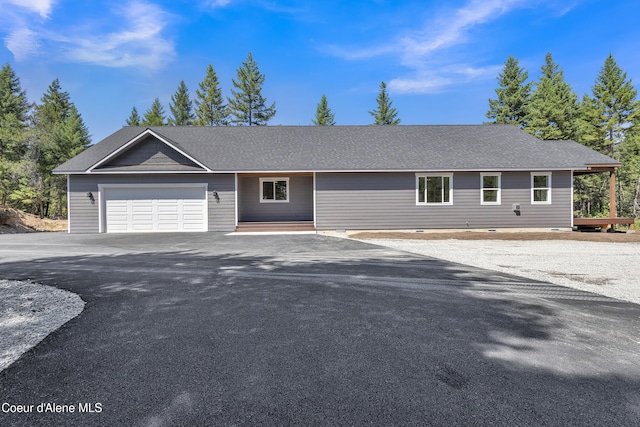 32926 N 10th Ave, Spirit Lake, ID 83869 - single story home featuring asphalt driveway and a garage