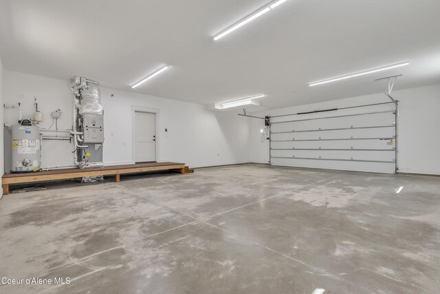 32926 N 10th Ave, Spirit Lake, ID 83869 - garage featuring gas water heater and heating unit