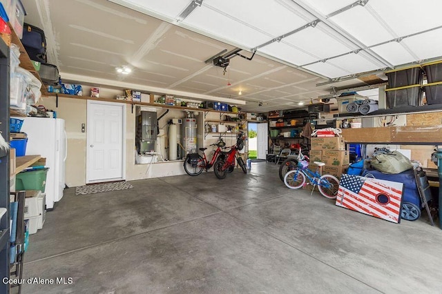 6487 W Covenant St, Rathdrum, ID 83858 - garage featuring heating unit and water heater