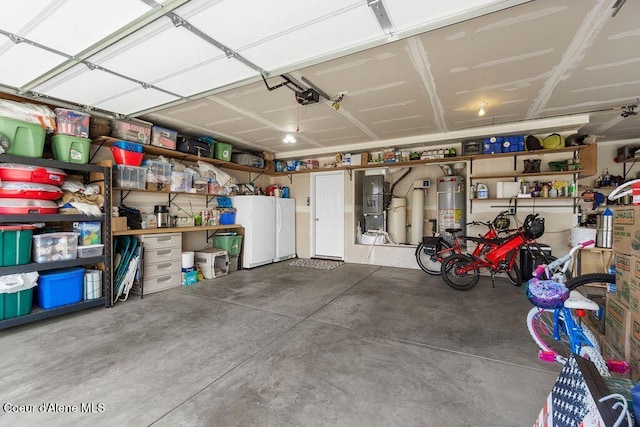 6487 W Covenant St, Rathdrum, ID 83858 - garage featuring gas water heater, a garage door opener, and heating unit