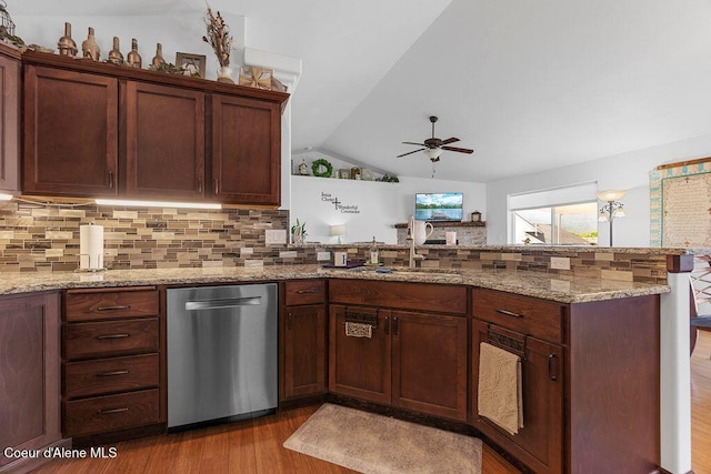 6487 W Covenant St, Rathdrum, ID 83858 - kitchen with dishwasher, ceiling fan, a peninsula, lofted ceiling, and wood finished floors