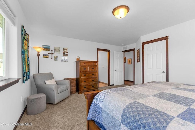 6487 W Covenant St, Rathdrum, ID 83858 - carpeted bedroom featuring multiple windows