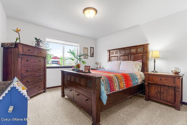6487 W Covenant St, Rathdrum, ID 83858 - bedroom with light carpet and baseboards