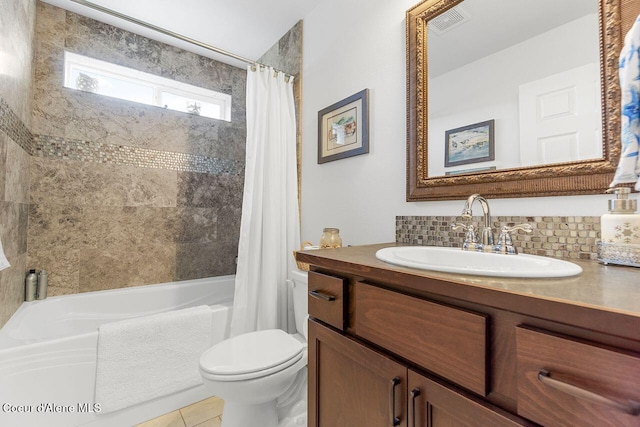 6487 W Covenant St, Rathdrum, ID 83858 - full bath with vanity, shower / bathtub combination with curtain, tile patterned flooring, and tasteful backsplash