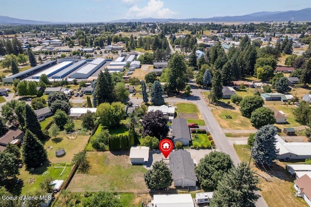320 E Dakota Ave, Hayden, ID 83835 - aerial perspective of suburban area with a mountain backdrop