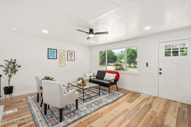320 E Dakota Ave, Hayden, ID 83835 - living area with plenty of natural light, ceiling fan, light wood-style floors, a textured ceiling, and recessed lighting