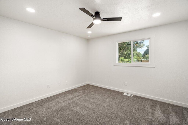 320 E Dakota Ave, Hayden, ID 83835 - unfurnished room with carpet floors, a ceiling fan, and recessed lighting