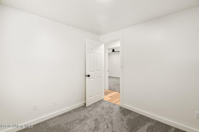 320 E Dakota Ave, Hayden, ID 83835 - spare room featuring carpet floors and baseboards