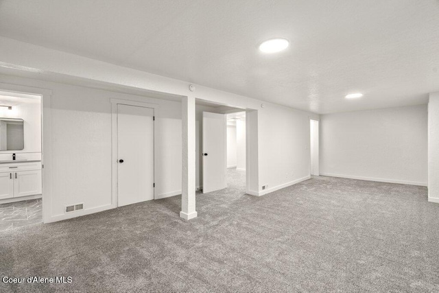 320 E Dakota Ave, Hayden, ID 83835 - finished basement featuring a sink and carpet flooring