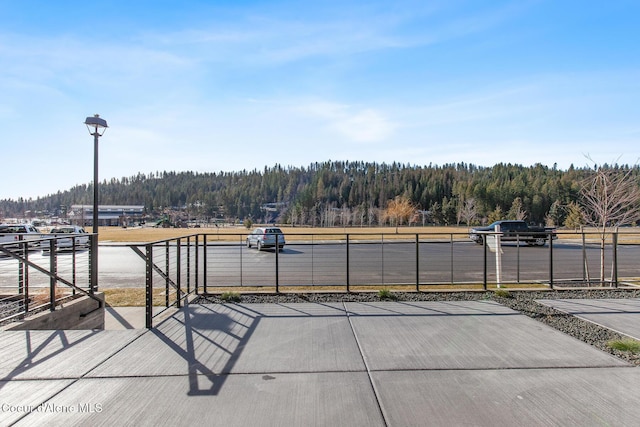 2492 N Atlas Rd, Coeur Dalene, ID 83814 - view of patio featuring a wooded view