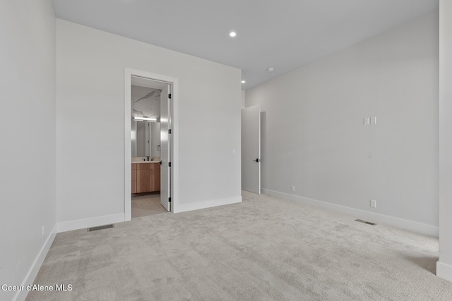 2492 N Atlas Rd, Coeur Dalene, ID 83814 - empty room with light colored carpet and recessed lighting