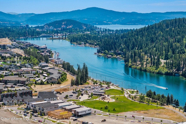 2492 N Atlas Rd, Coeur Dalene, ID 83814 - drone / aerial view of a water and mountain view and a heavily wooded area
