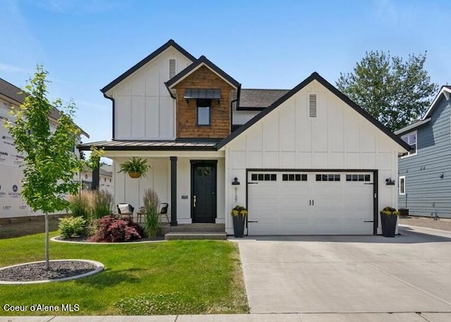9137 N Raintree Ln, Hayden, ID 83835 - modern farmhouse featuring board and batten siding, a standing seam roof, an attached garage, and concrete driveway