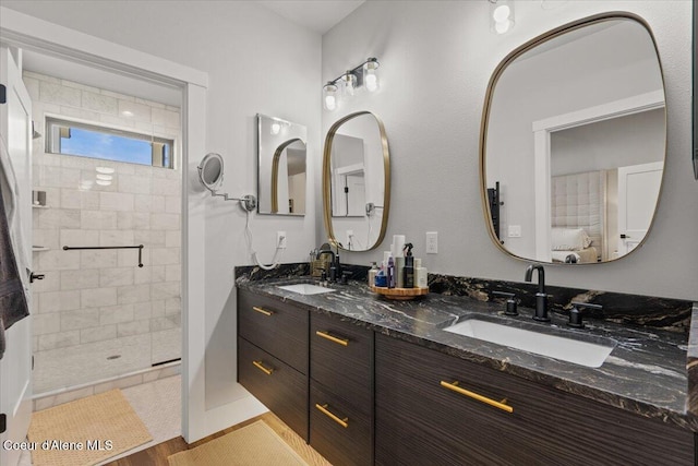 9137 N Raintree Ln, Hayden, ID 83835 - full bath featuring double vanity, a stall shower, and wood finished floors