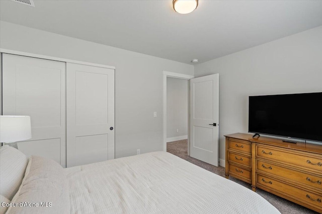 9137 N Raintree Ln, Hayden, ID 83835 - bedroom featuring carpet and a closet