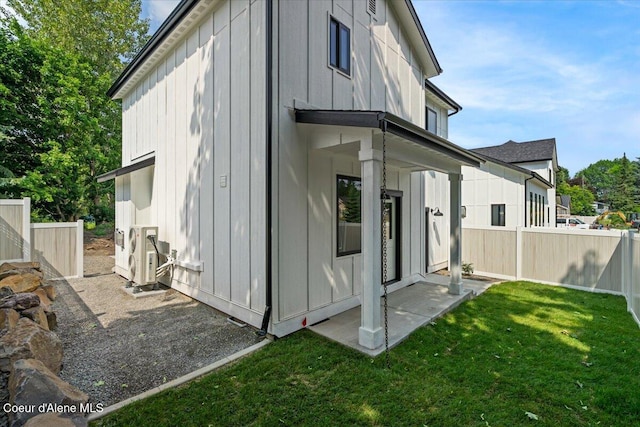 9137 N Raintree Ln, Hayden, ID 83835 - rear view of house with board and batten siding