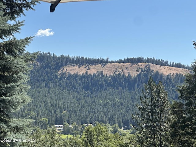 1150 Elm Dr, Saint Maries, ID 83861 - view of mountain background featuring a heavily wooded area