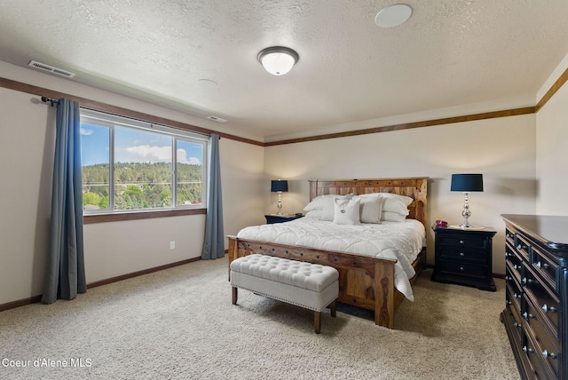 13408 E Copper River Ln, Spokane, WA 99206 - carpeted bedroom with a textured ceiling and baseboards