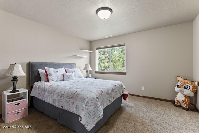13408 E Copper River Ln, Spokane, WA 99206 - bedroom featuring carpet floors and a textured ceiling
