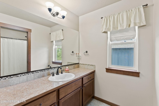 13408 E Copper River Ln, Spokane, WA 99206 - full bath featuring vanity and baseboards