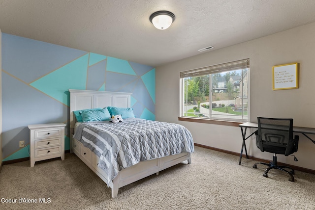 13408 E Copper River Ln, Spokane, WA 99206 - bedroom featuring carpet flooring and a textured ceiling