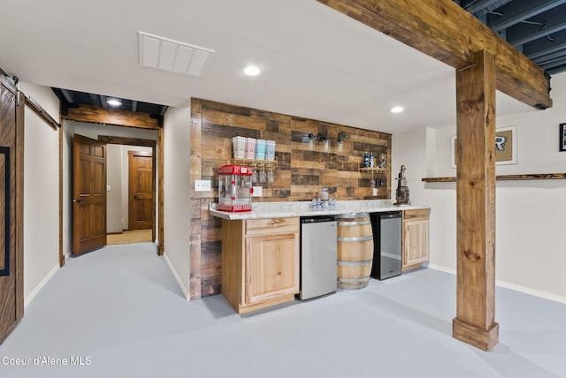 13408 E Copper River Ln, Spokane, WA 99206 - indoor wet bar featuring concrete flooring, recessed lighting, a barn door, and refrigerator