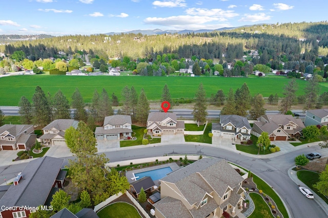13408 E Copper River Ln, Spokane, WA 99206 - aerial perspective of suburban area with a mountain backdrop