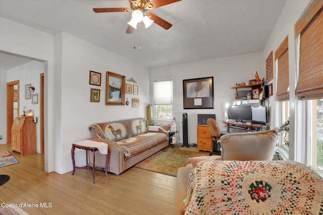 1505 N 3rd, Coeur Dalene, ID 83814 - living area featuring light wood-type flooring, a ceiling fan, and a desk