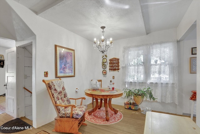 1505 N 3rd, Coeur Dalene, ID 83814 - dining room featuring a chandelier and hardwood / wood-style floors
