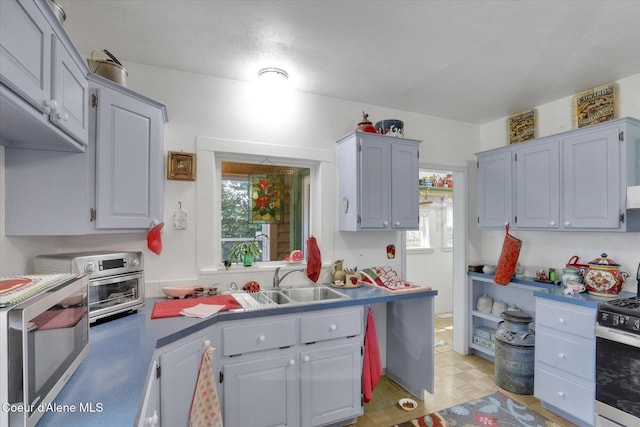 1505 N 3rd, Coeur Dalene, ID 83814 - kitchen with appliances with stainless steel finishes and a sink