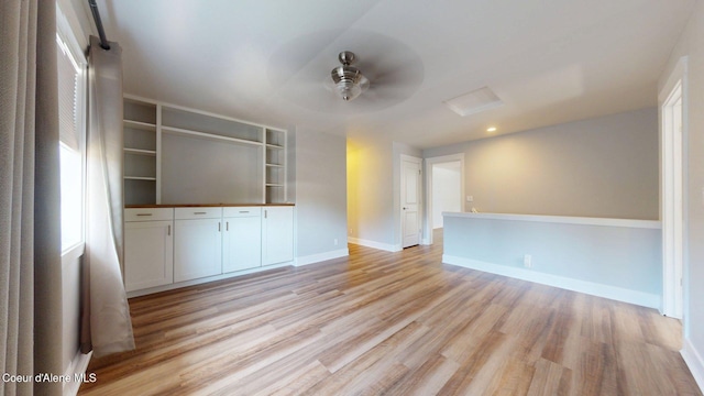 1121 E Indiana Ave, Coeur Dalene, ID 83814 - empty room featuring light wood finished floors and attic access