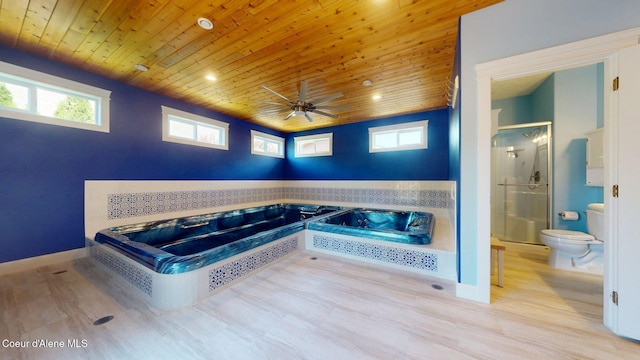 1121 E Indiana Ave, Coeur Dalene, ID 83814 - bathroom with wood ceiling, a bath, a stall shower, wood finished floors, and recessed lighting
