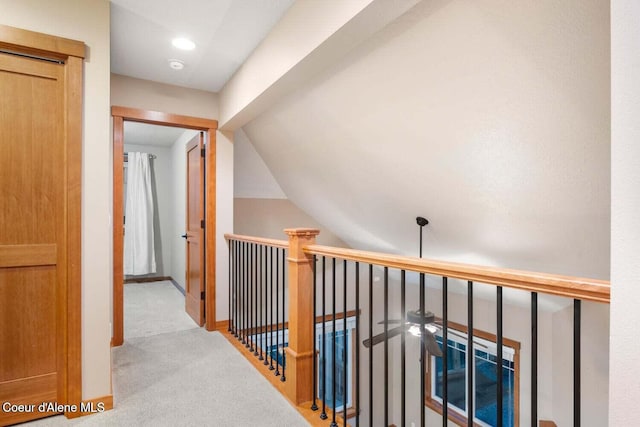 2848 N O Connor Blvd, Post Falls, ID 83854 - hallway with an upstairs landing, carpet, and vaulted ceiling