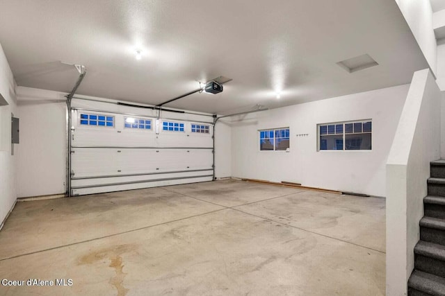 2848 N O Connor Blvd, Post Falls, ID 83854 - garage featuring a garage door opener and electric panel