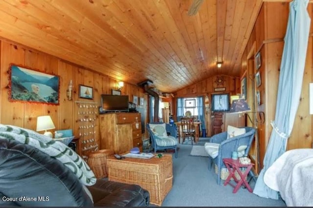 16946 E Jds E Dock 27, Bayview, ID 83803 - living room with carpet, lofted ceiling, wooden walls, and wood ceiling