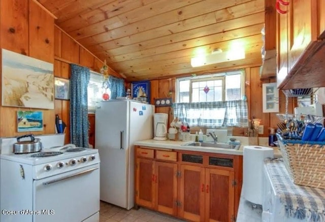 16946 E Jds E Dock 27, Bayview, ID 83803 - kitchen featuring white appliances, lofted ceiling, wood ceiling, brown cabinets, and light countertops