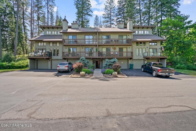 5276 W Racquet Rd Unit 9, Rathdrum, ID 83858 - multi unit property with a chimney and a balcony