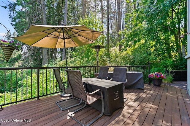 5276 W Racquet Rd Unit 9, Rathdrum, ID 83858 - deck featuring outdoor dining area