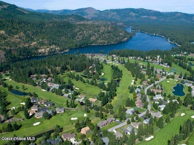 5276 W Racquet Rd Unit 9, Rathdrum, ID 83858 - bird's eye view of a heavily wooded area and a water and mountain view