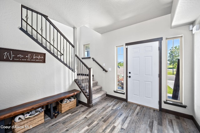 2499 N N Side Saddle Ln, Post Falls, ID 83854 - entrance foyer featuring wood finished floors and stairway