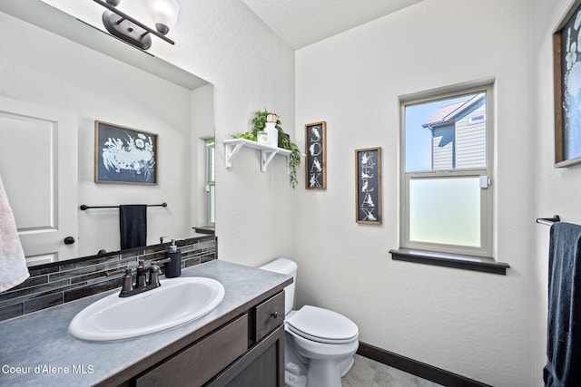 2499 N N Side Saddle Ln, Post Falls, ID 83854 - half bathroom featuring vanity and a textured wall