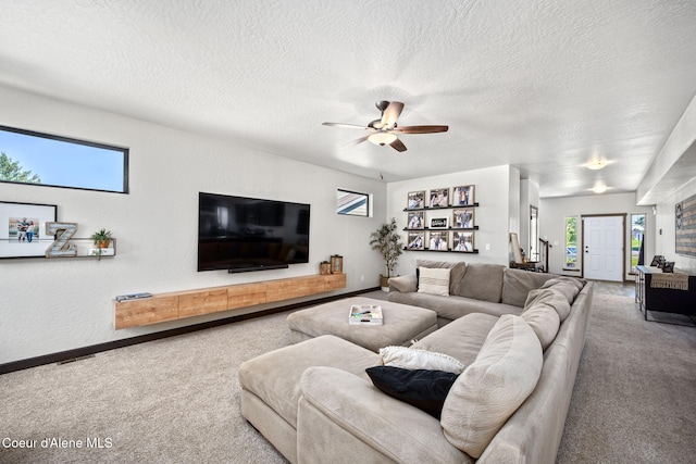2499 N N Side Saddle Ln, Post Falls, ID 83854 - living area with carpet, a ceiling fan, and a textured ceiling