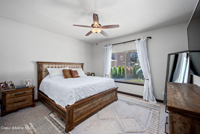 2499 N N Side Saddle Ln, Post Falls, ID 83854 - bedroom with light colored carpet and a ceiling fan