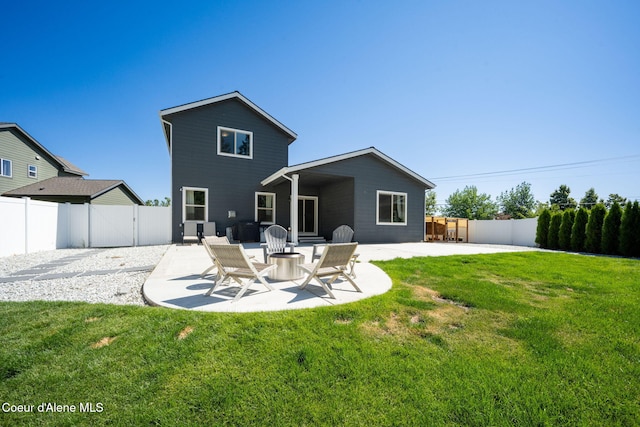 2499 N N Side Saddle Ln, Post Falls, ID 83854 - rear view of property with a patio area and a fenced backyard