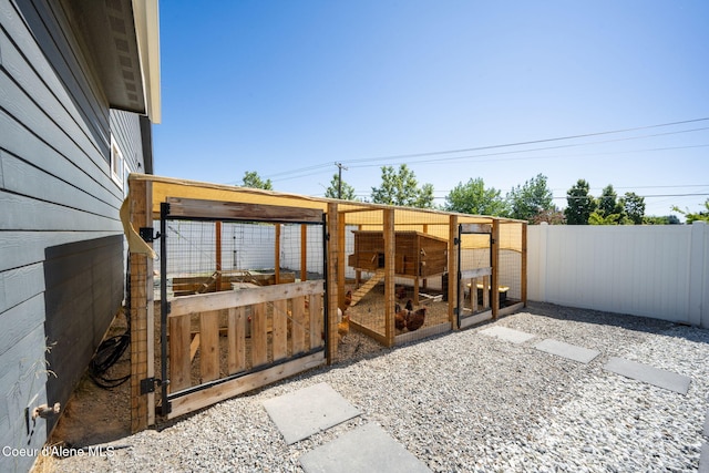 2499 N N Side Saddle Ln, Post Falls, ID 83854 - view of patio with exterior structure and an outbuilding
