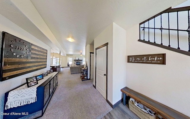 2499 N N Side Saddle Ln, Post Falls, ID 83854 - corridor with carpet and wood finished floors