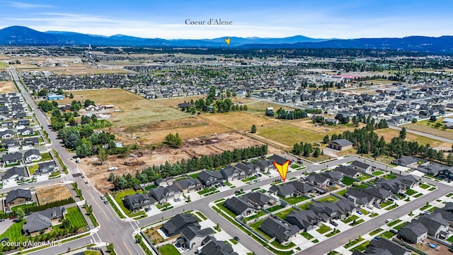 3631 N Britton Rd, Post Falls, ID 83854 - aerial view of property's location with a mountain backdrop and nearby suburban area