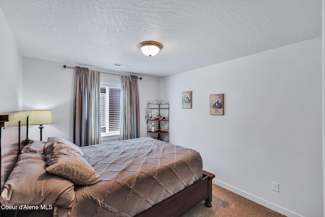 3631 N Britton Rd, Post Falls, ID 83854 - carpeted bedroom featuring a textured ceiling