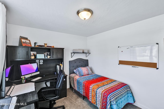 3631 N Britton Rd, Post Falls, ID 83854 - carpeted bedroom with a desk and baseboards